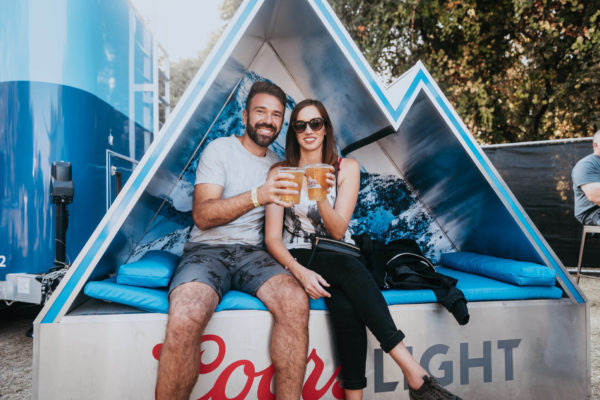 Couple cheers on Coors Light bench copy