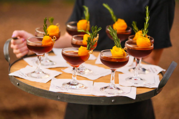 orange peel-rosemary sprig cocktails